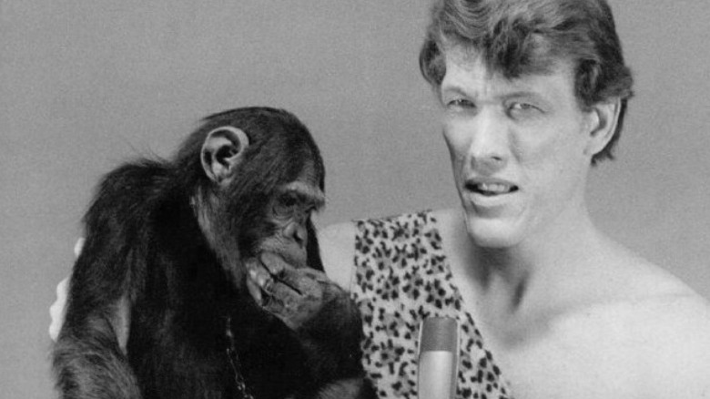 ted cassidy as tarzan with a chimpanzee