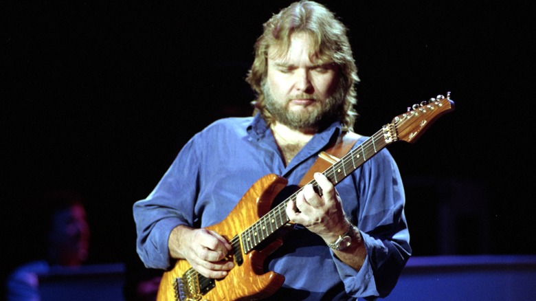 Ed King plays the guitar