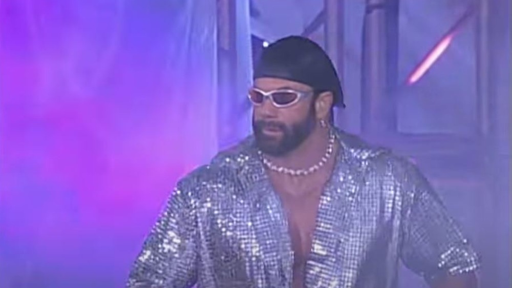 Randy Savage wearing hat and sunglasses