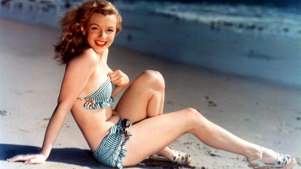 Monroe posing for a photo during her modeling career