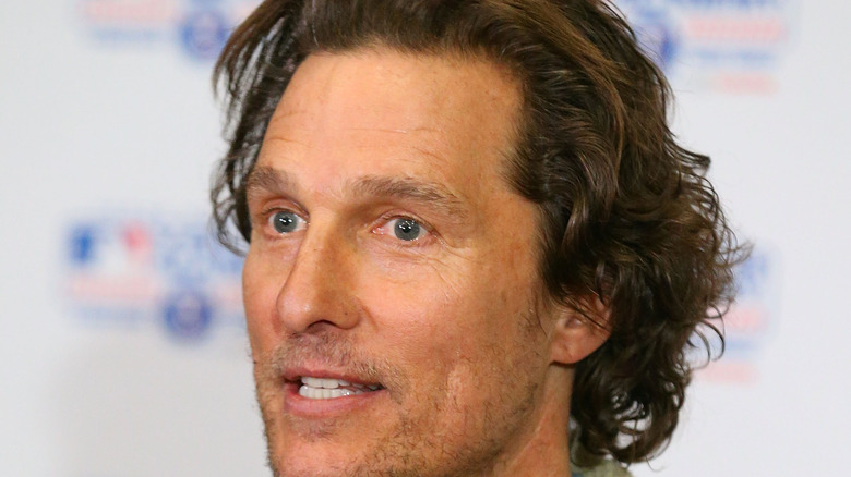 Matthew McConaughey showing teeth