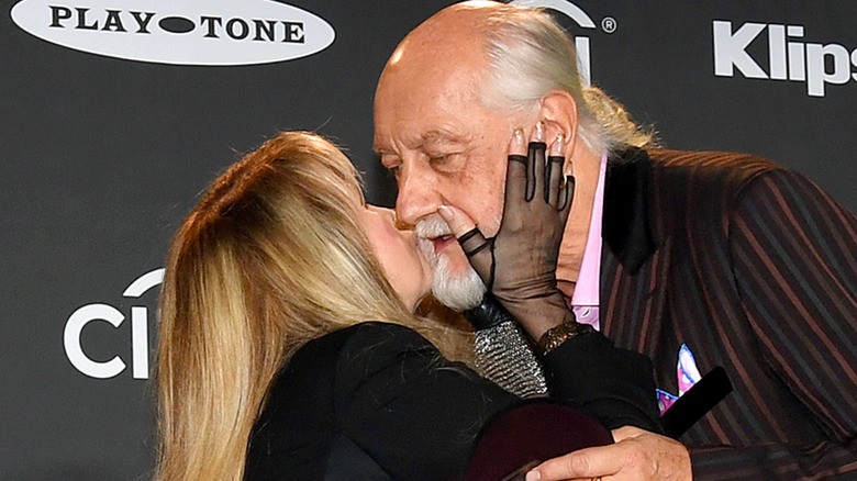 Mick Fleetwood with Stevie Nicks kissing