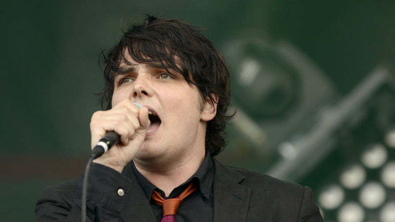 Gerard Way singing with a microphone