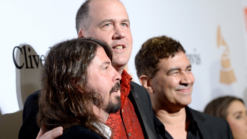 krist novoselic, Pat Smear, and dave grohl smiling