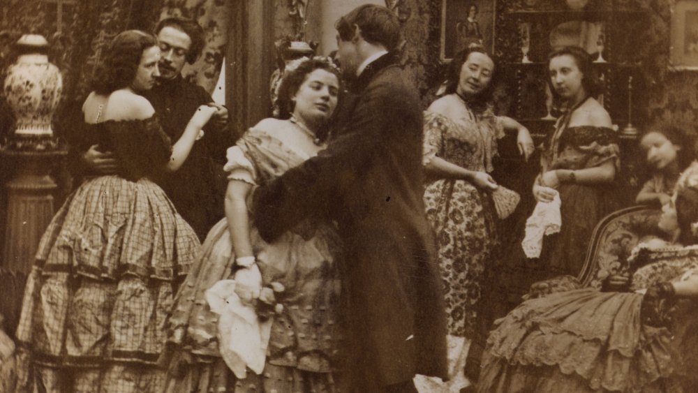 A Victorian-era party with dancing.