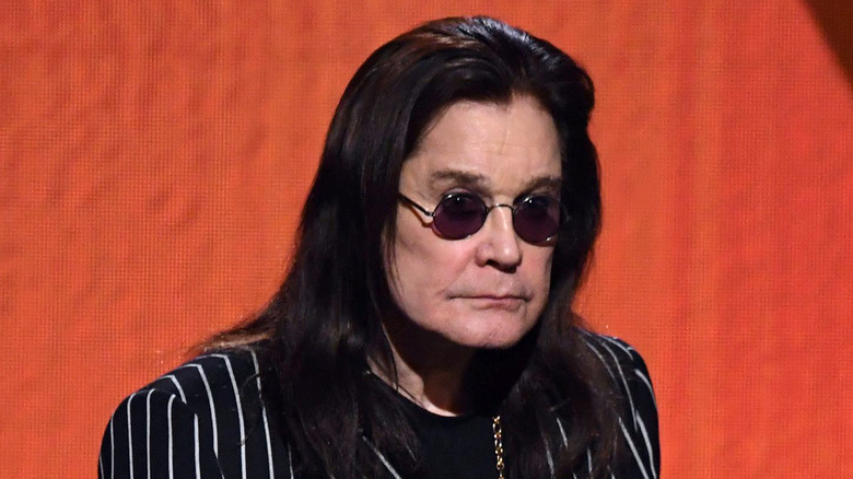 Ozzy Osbourne onstage presenting at an award show