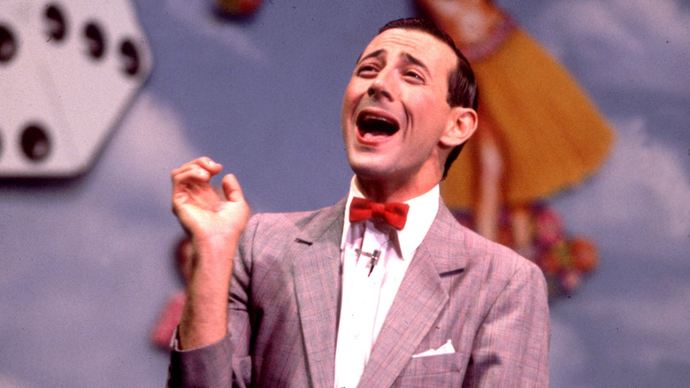 Paul Reubens laughing as Pee-wee Herman