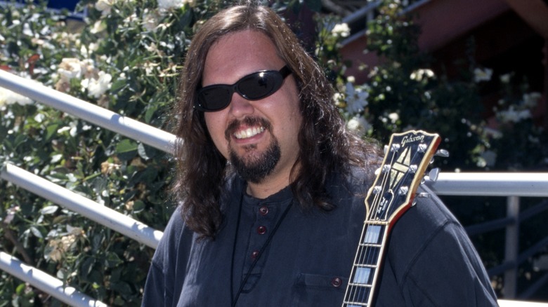 Gary Lee Conner holding guitar