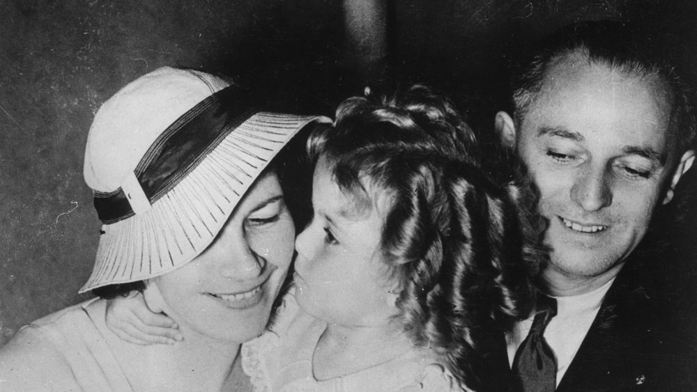 The child filmstar Shirley Temple with her parents George F. and Gertrude Temple. July 28th 1934.