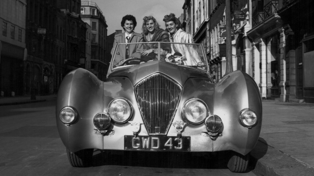 The Andrews Sisters, and a car