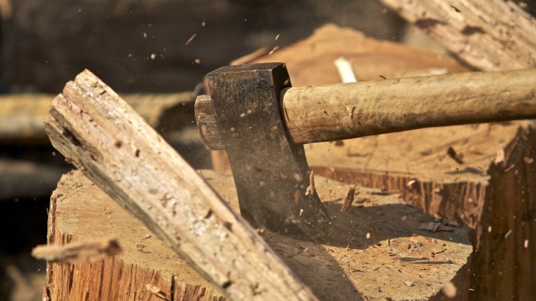 axe splitting wood