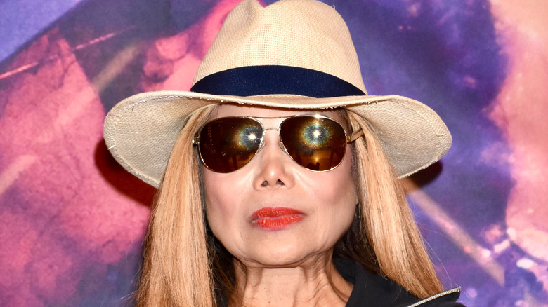 La Toya Jackson in hat and sunglasses