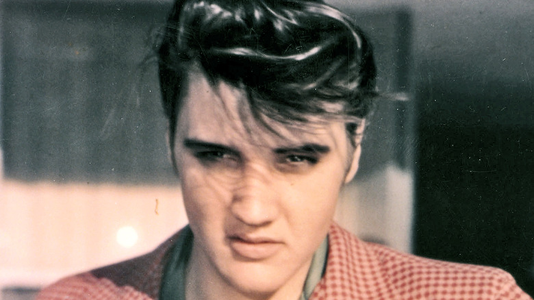 Elvis Presley in a checkered suit