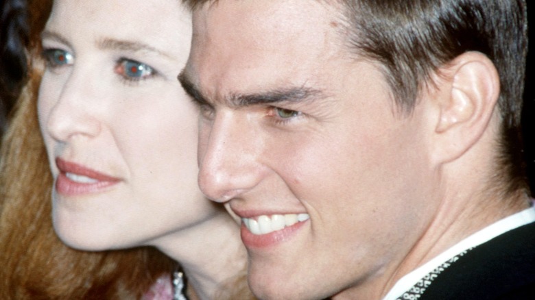 Mimi Rogers and Tom Cruise smile for the red carpet