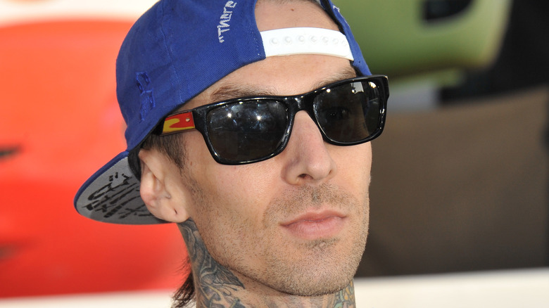Travis Barker Blink-182 blue hat sunglasses