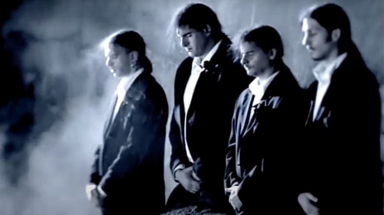 Type O Negative band standing in suits