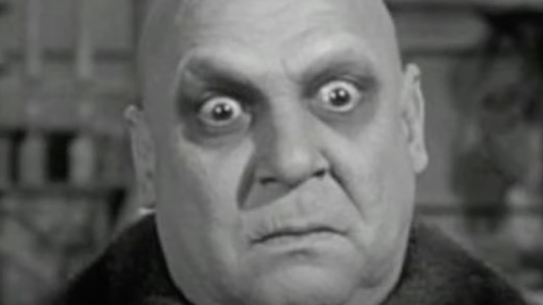 Jackie Coogan as Uncle Fester on The Addams Family