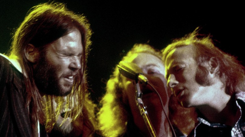 Young, Crosby, and Stills performing