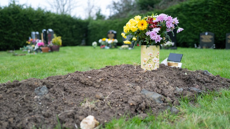 flowers on fresh grave