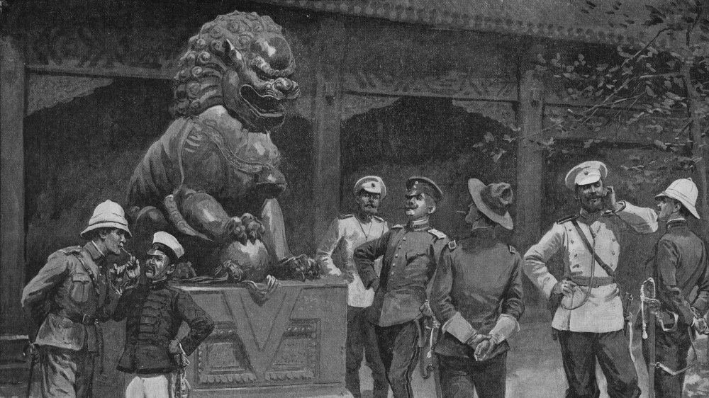 Officers of the Eight-Nation Alliance at the gates of the Forbidden City in Beijing, China, during the Boxer Rebellion, circa 1900. 