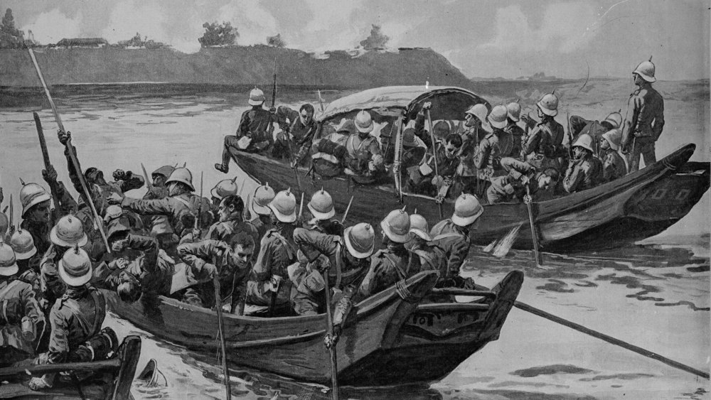 Admiral Seymour's relief column crosses a river on junks to attack a Chinese arsenal near Tientsin