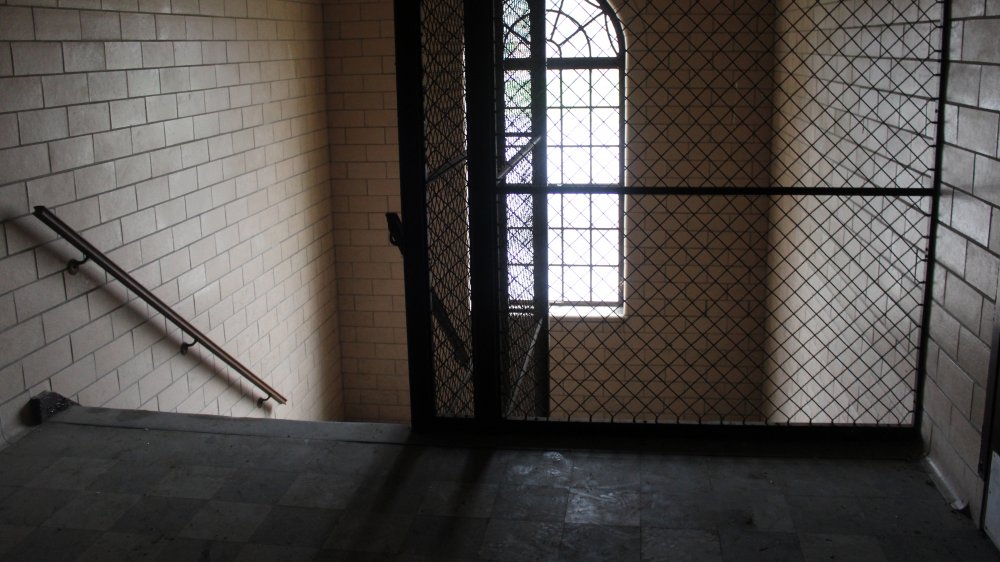 Corridor hallway of old abandoned asylum hospital building 