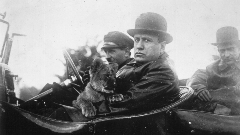 Mussolini in open car