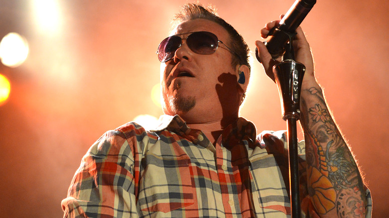 Steve Harwell on stage sunglasses mic