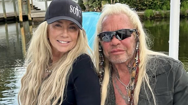 duane dog chapman in boat with francie frane smiling