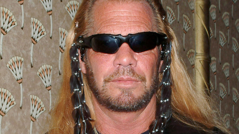 duane dog chapman staring sunglasses hair decorations