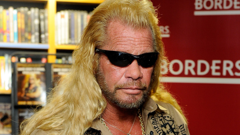 duane chapman sunglasses gold chain at borders