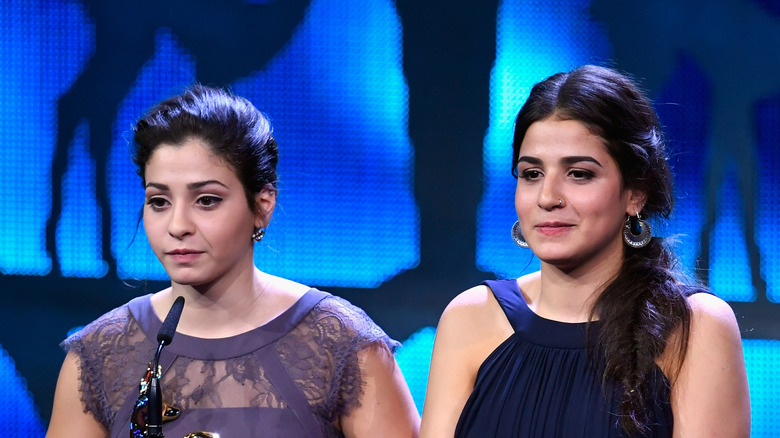 Yusra and Sarah Mardini being interviewed