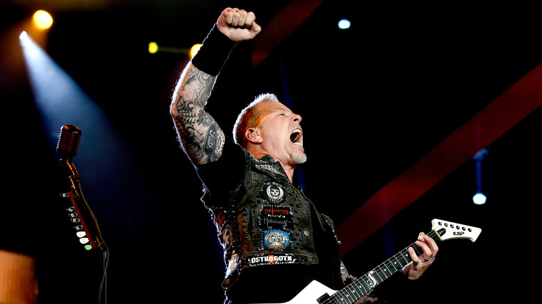 James Hetfield fist holding guitar