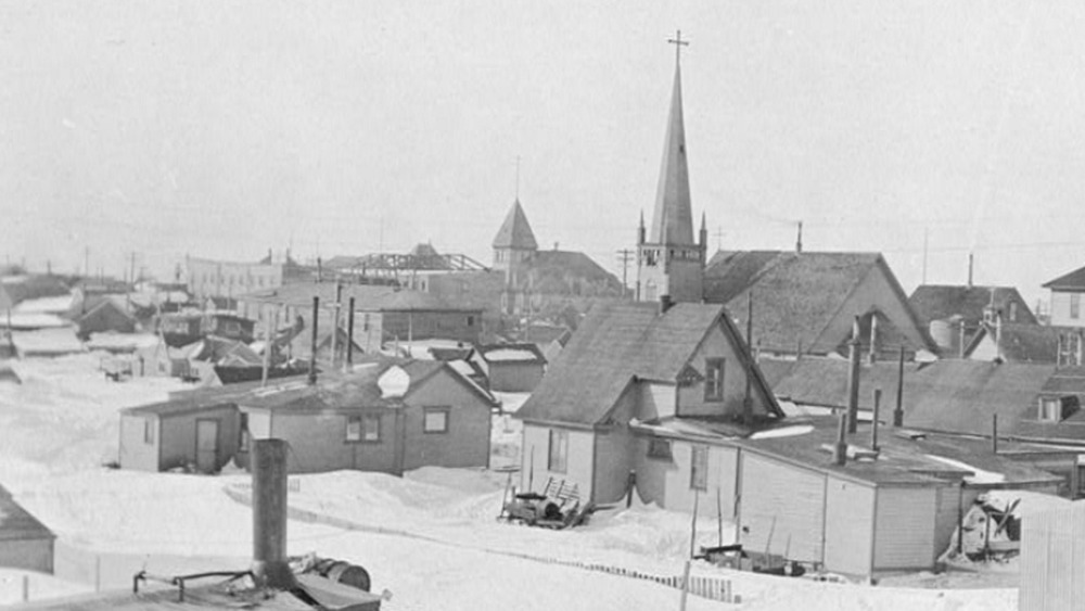 Nome, AK, in 1916, with buildings and snow