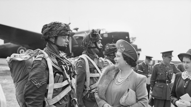 Queen and Princess Elizabeth speak to paratroopers in preparation for D-Day