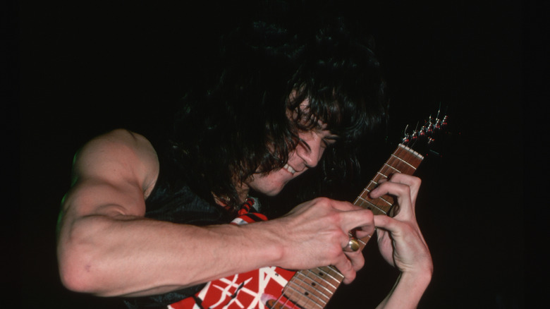 Eddie Van Halen using tapping technique on guitar