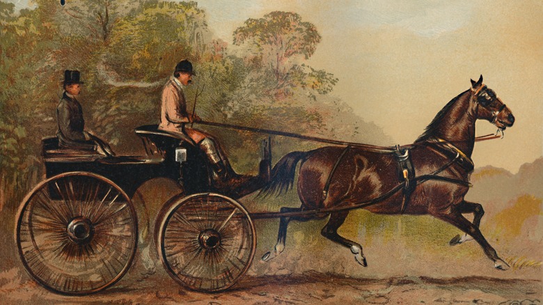 Two men driving horse and buggy