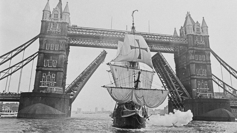 Sail boat going under Tower Bridge, London