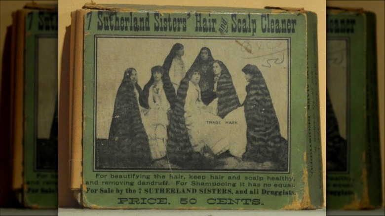 Sutherland sisters posing with their hair on a product package