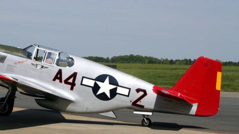 a red-tailed P-51 Mustang