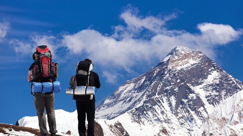 two people climbing Everest