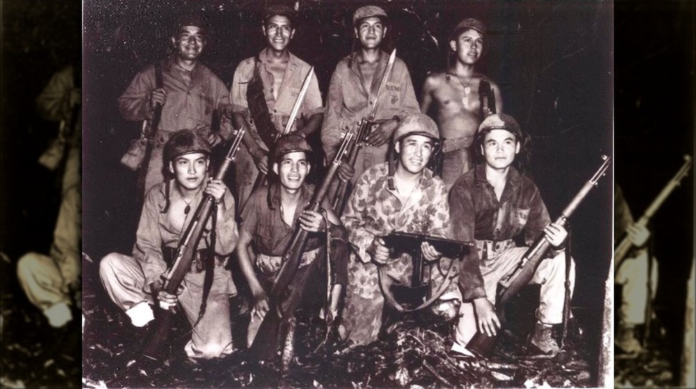 Code talkers posing with guns