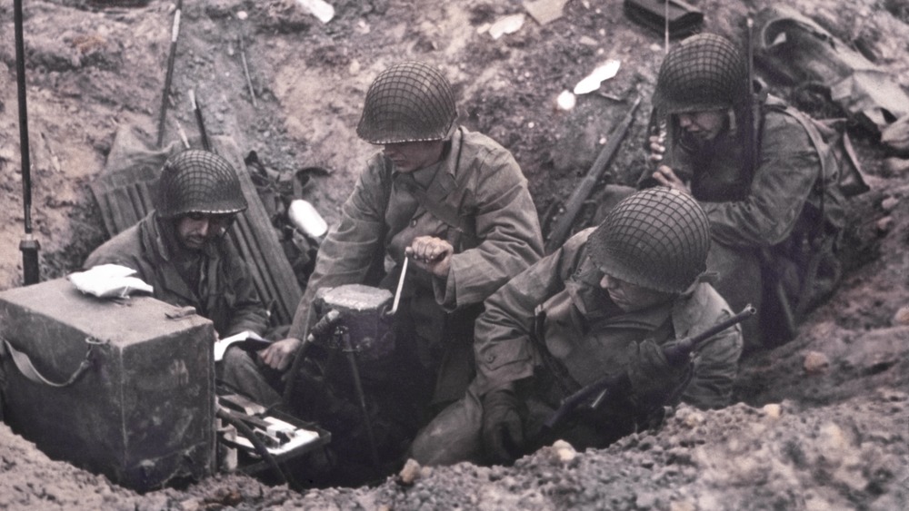World War II radio operators in trenches