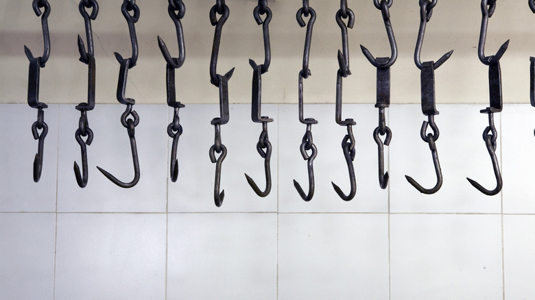 Empty meat hooks 