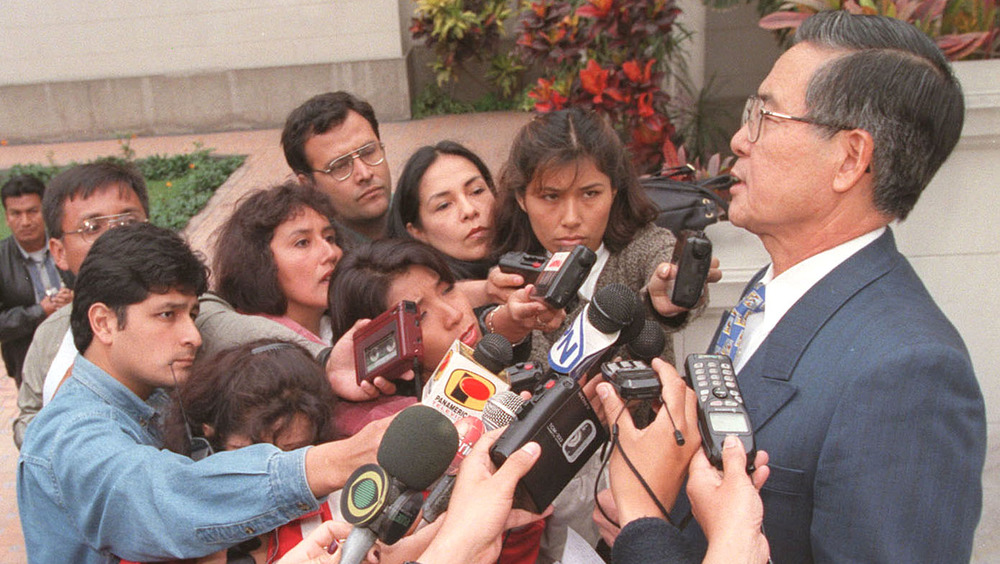 Fujimori questioned by reporters