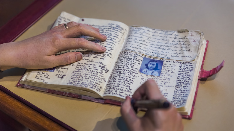 Anne Frank wax figure writing 