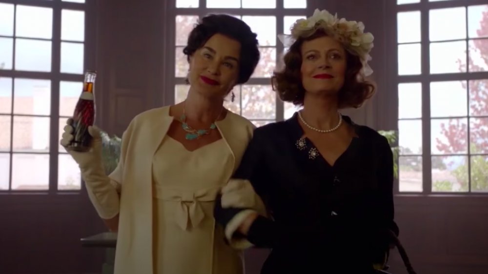 Jessica Lange and Susan Sarandon arm in arm in Feud