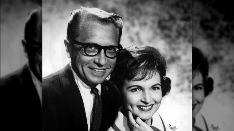 Betty White and Allen Ludden posing