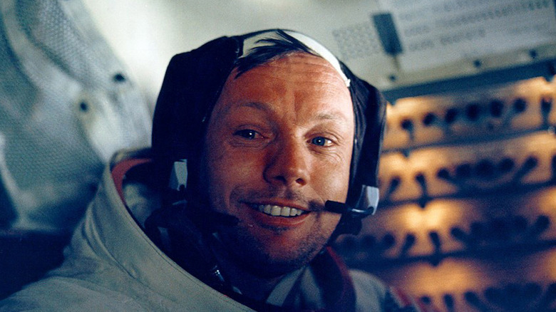 neil armstrong smiles in capsule