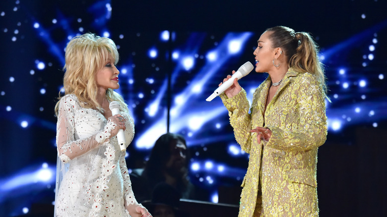 Dolly Parton and Miley Cyrus performing